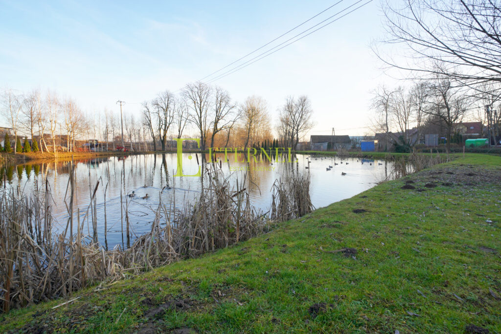 Działka budowlana nad stawem 12 arów – Głęboka
