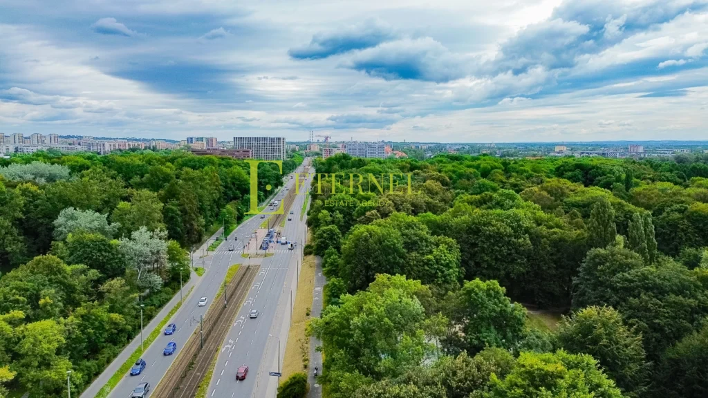 Działka inwestycyjna 5,1 ara z budynkiem – Aleja Jana Pawła II