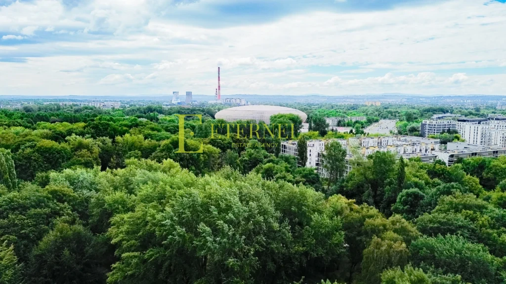 Działka inwestycyjna 5,1 ara z budynkiem – Aleja Jana Pawła II