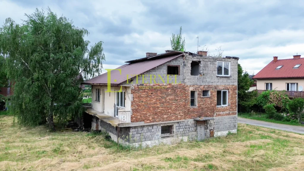 Działka mieszkaniowo-usługowa 15 arów przy DK94 na sprzedaż – Modlnica, gmina Wielka Wieś