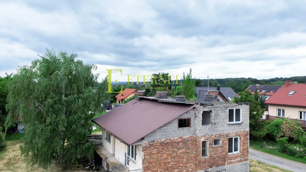 Działka mieszkaniowo-usługowa 15 arów przy DK94 na sprzedaż – Modlnica, gmina Wielka Wieś