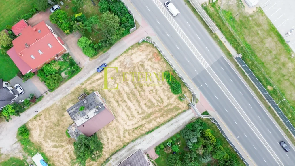 Działka mieszkaniowo-usługowa 15 arów przy DK94 na sprzedaż – Modlnica, gmina Wielka Wieś