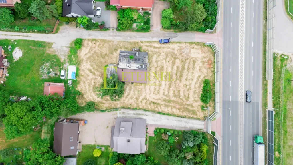 Działka mieszkaniowo-usługowa 15 arów przy DK94 na sprzedaż – Modlnica, gmina Wielka Wieś